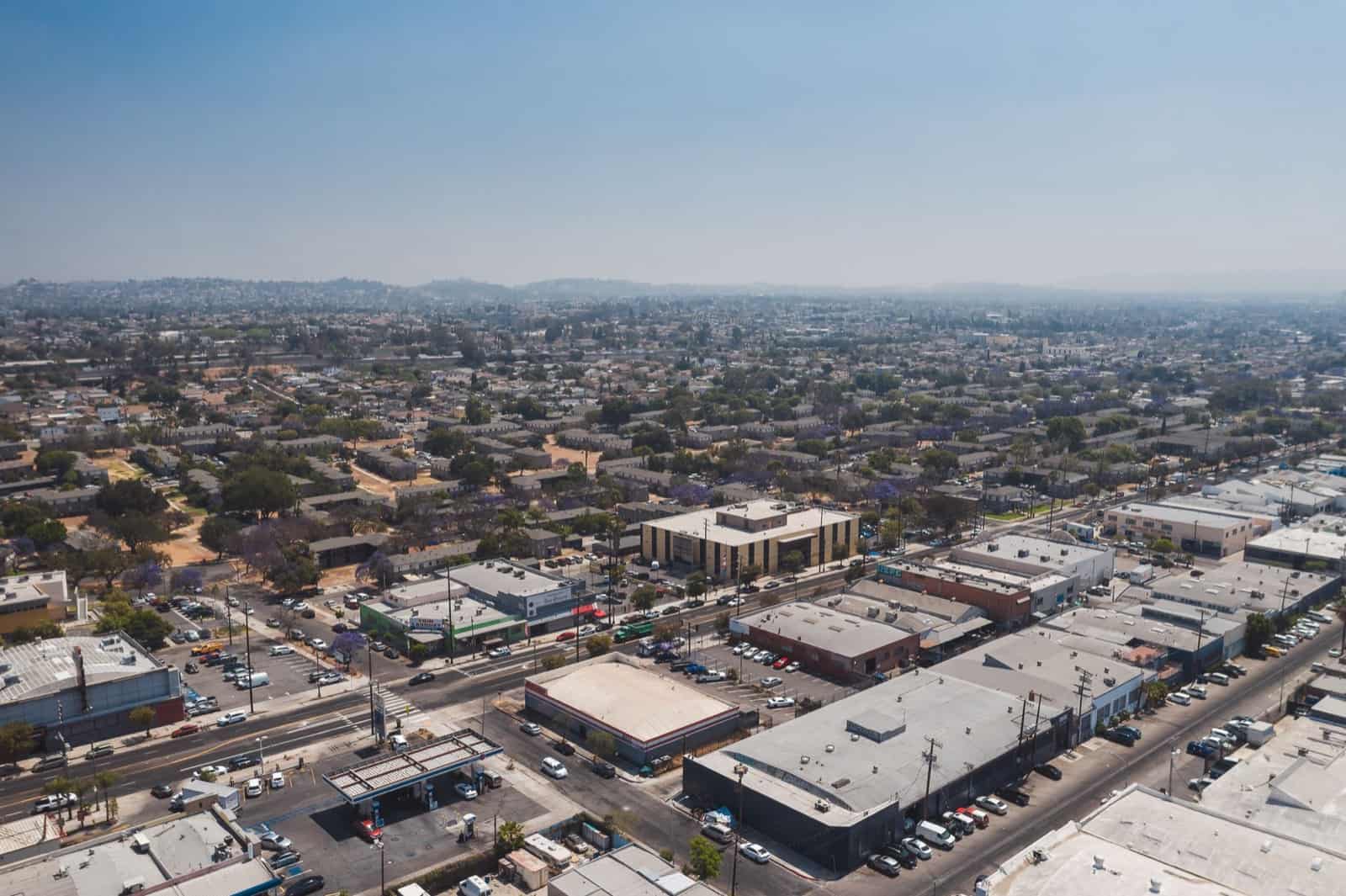 Aerial view of a dense residential and commercial neighborhood in a Sun Belt city