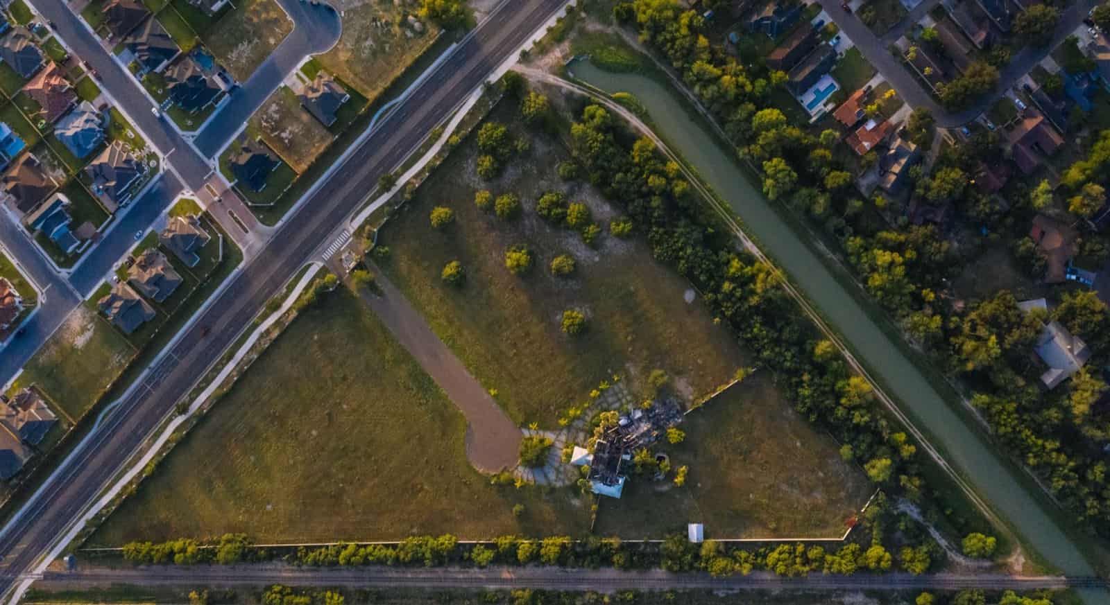 Aerial view of a South Texas residential subdivision at golden hour