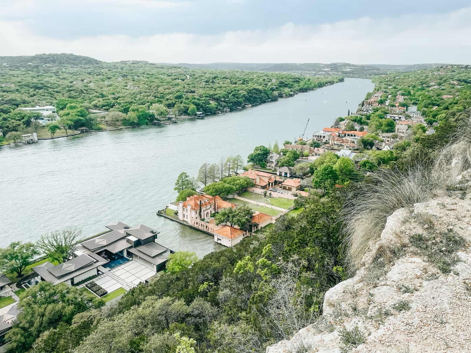 A river winding through the wooded hills of the Texas Hill Country