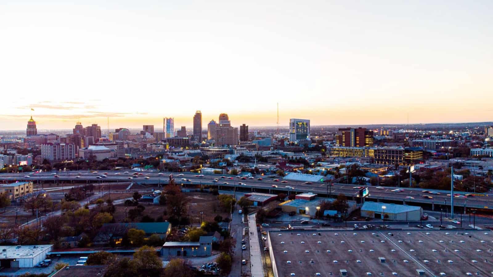 The downtown San Antonio, Texas skyline at sunset, with the gold-topped Tower Life Building