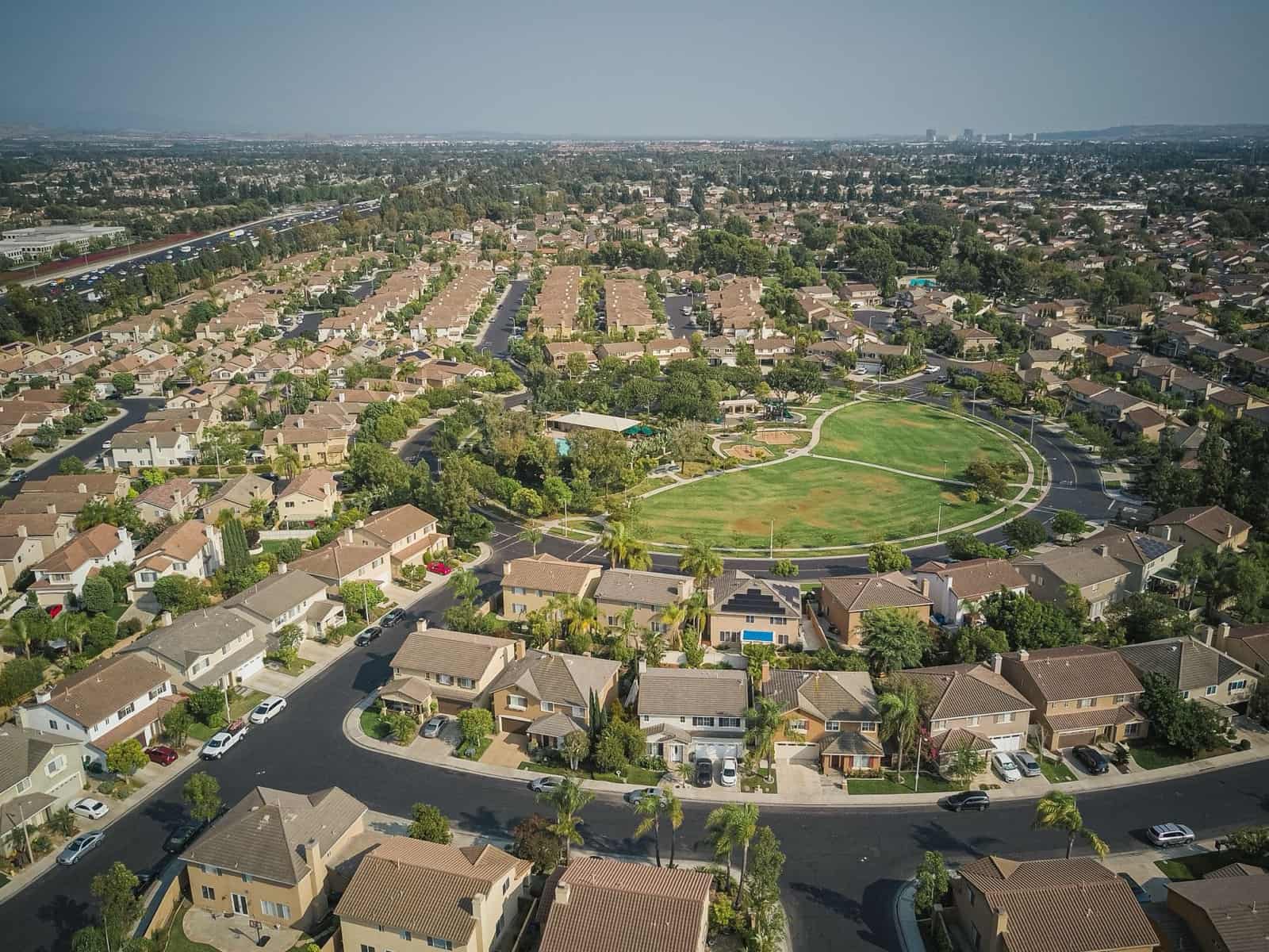 Aerial view of a Sun Belt residential neighborhood built around a central park