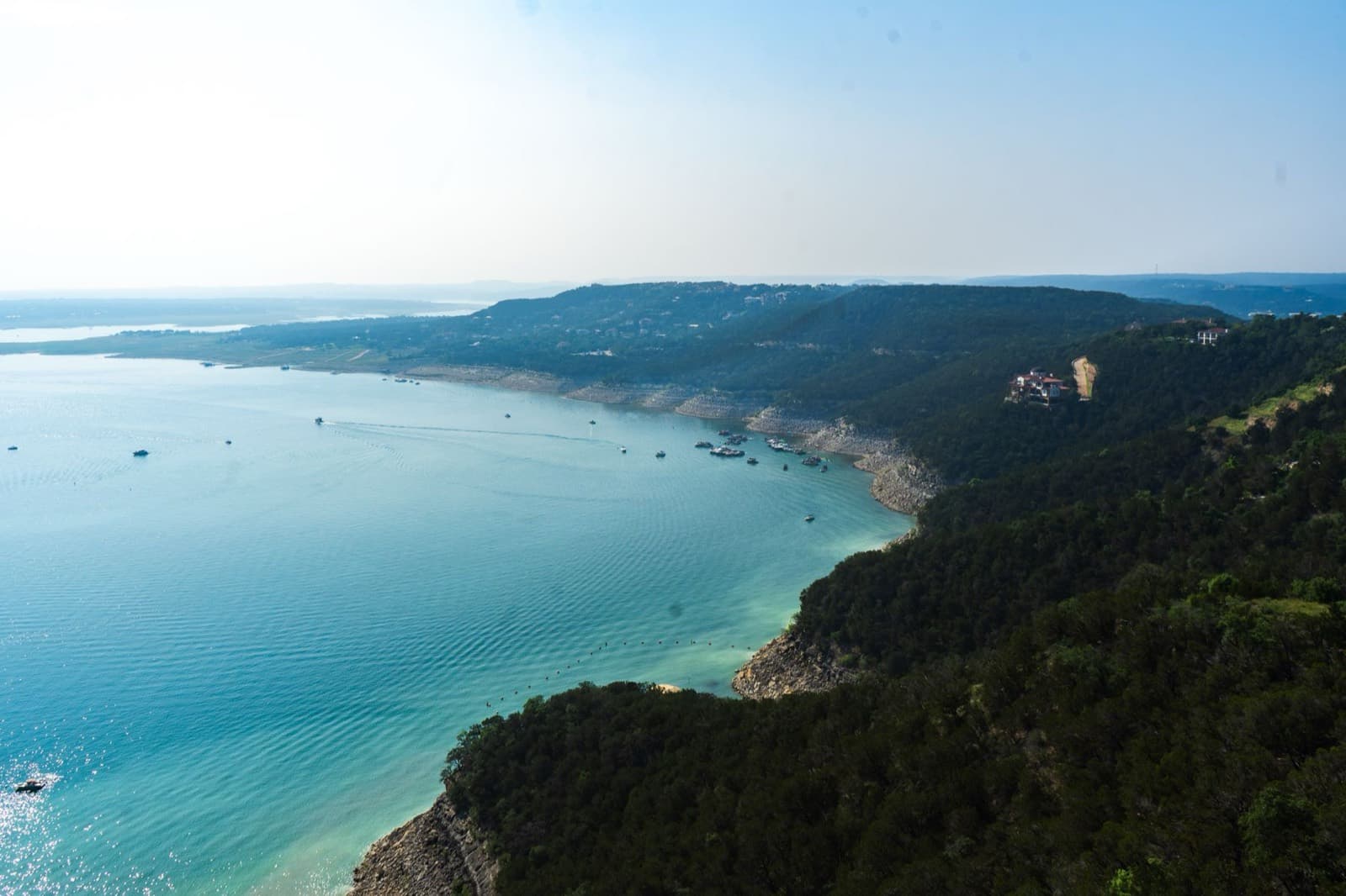 A reservoir set among the rugged hills of the Texas Hill Country